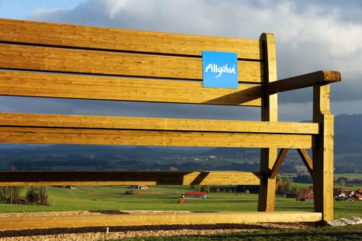 Large wooden bench in the Allgäu. Large Allgäu wooden bench as a tourist attraction