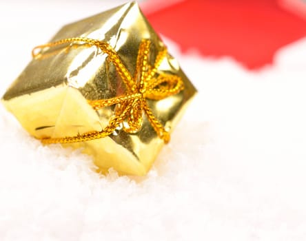 Christmas present in snow with space for text or image