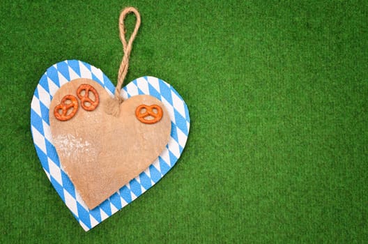 Oktoberfest background with heart shape and Bavarian flag
