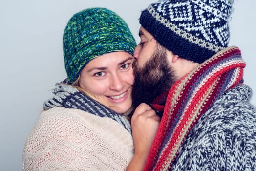 young man and woman in winter dress