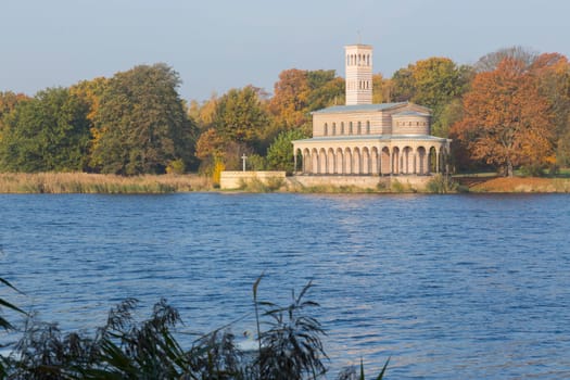 Sakrower church on the Jungfernsee with swans in the foreground