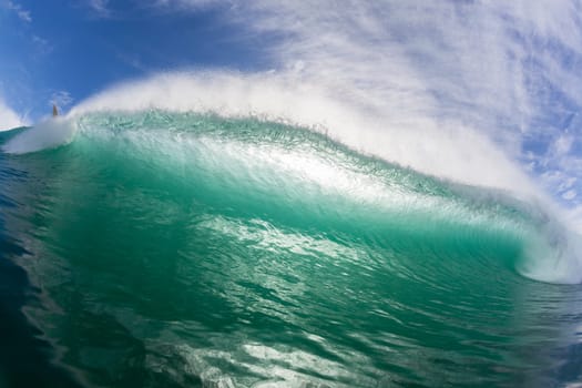 Wave crashing hollow face to face swimming ocean encounter.