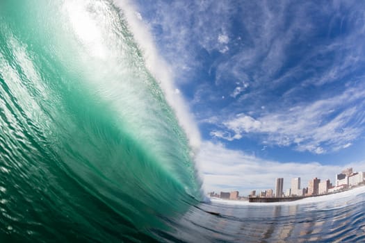 Wave crashing hollow face to face  swimming ocean encounter.