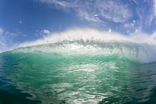 Wave crashing hollow face to face swimming ocean encounter.