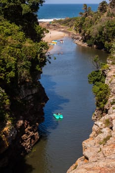 Rugged scenic beauty holiday destination of uvongo waterfall cliffs ravine lagoon beach ocean landscape