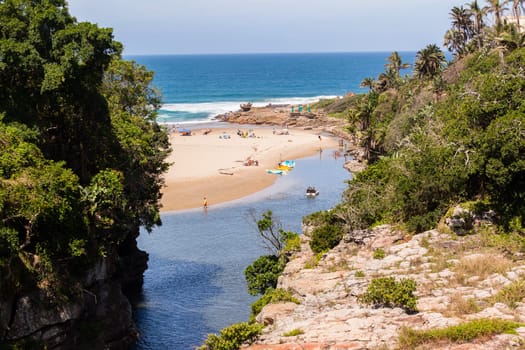 Rugged scenic beauty holiday destination of uvongo waterfall cliffs ravine lagoon beach ocean landscape
