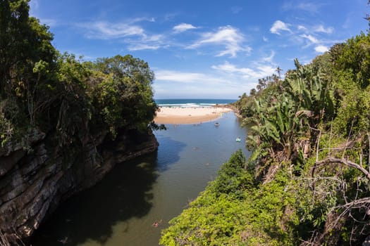 Rugged scenic beauty holiday destination of uvongo waterfall cliffs ravine lagoon beach ocean landscape
