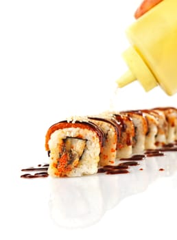 Traditional japanese sushi  with sauce isolated on white background