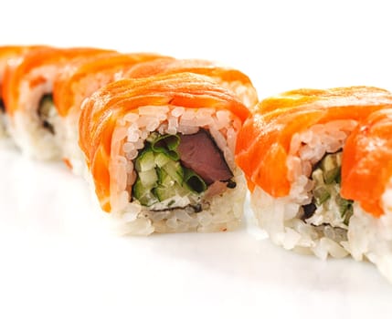 traditional fresh japanese sushi rolls on a white background