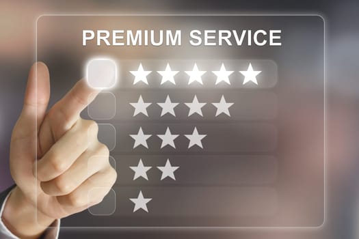 business hand clicking premium service on virtual screen interface