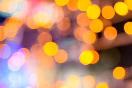 Abstract circular natural orange and yellow light bokeh background