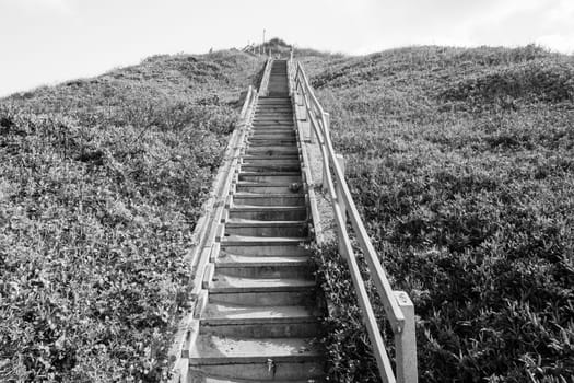 Stairs up hillside in black and white vintage tone