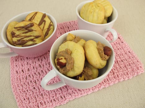 Cups filled with cookies
