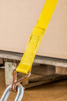 Load securing with a belt