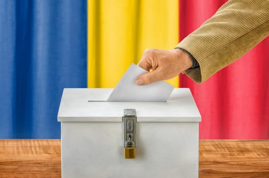 Man throws ballot papers into ballot box - Romania