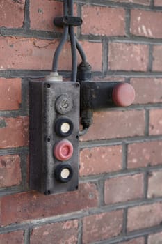 Emergency switch on the facade of a warehouse in the port of Magdeburg
