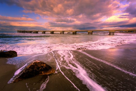 Bottom view of the sea pier in Marina di Massa using the hdr technique