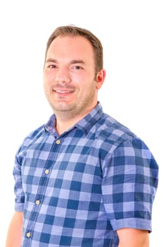 Casual young man looking at camera and smiling on white background.