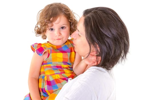 Mother teaching discipline her little daughter on white background.