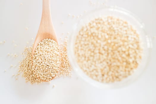 Raw organic white quinoa seeds, stock photo