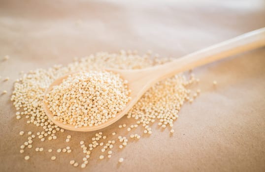 Raw organic white quinoa seeds, stock photo