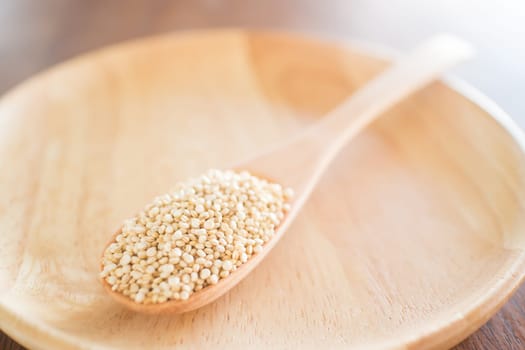Raw organic white quinoa seeds, stock photo