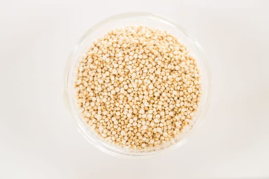 Raw organic white quinoa seeds, stock photo