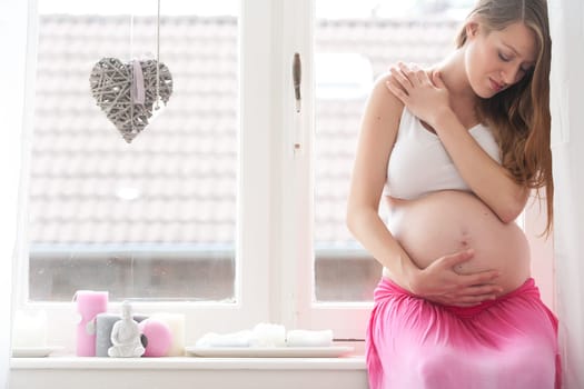 Young new mother is waiting for her child