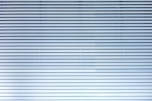 Grey blue metal / aluminium material background - horizontal lamellae