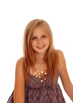 A happy little girl in a burgundy dress, smiling, looking onto the camera, .isolated for white background..