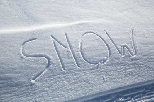The word SNOW written in the snow