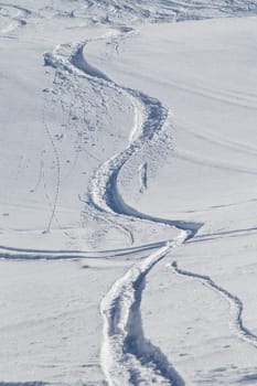 Ski slopes in the fresh snow coming from the mountain