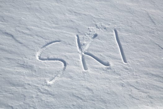 The word SKI written in the snow