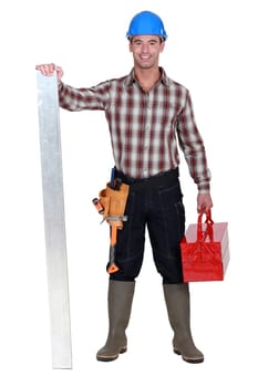 Manual worker stood with tool-box
