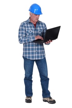 Builder with a laptop