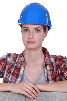 Portrait of woman with construction helmet