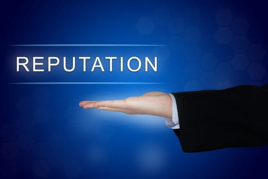 reputation button with business hand on blue background
