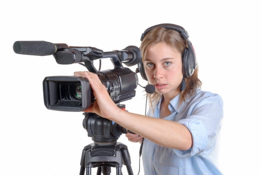A young woman with a video camera and headphone