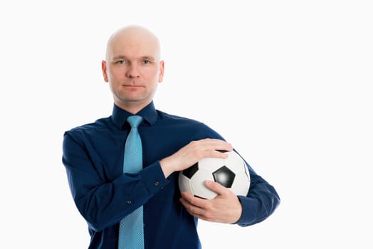 portrait of a young businessman with soccer ball in front of white background