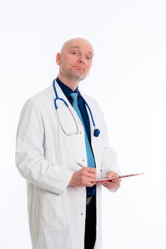 friendly young doctor with clipboard in front of white background