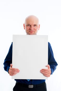 young bald headed man with a white canvas