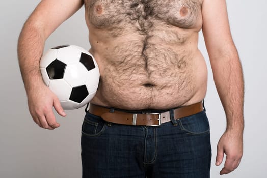 portly belly of a man with black and white football