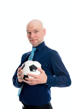 portrait of a young businessman with soccer ball in front of white background