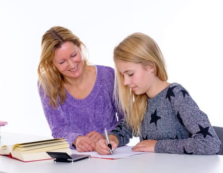 girl learning together with teacher in the classroom