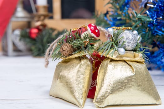 a christmas decoration with two small gifts