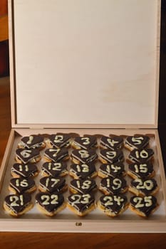 Box of 25 sweet hearts as an advent calendar for the last days of December before Christmas.