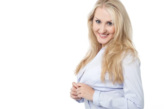 Flirtatious woman unbuttoning her shirt