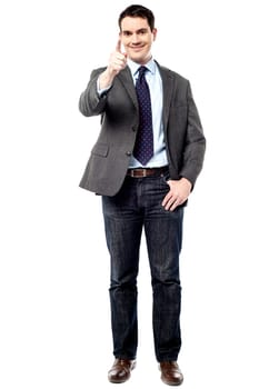 Young male manager pointing at you