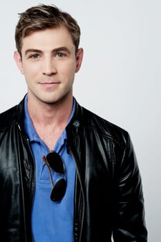 Young stylish guy in leather jacket