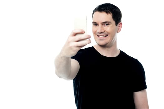 Man taking photograph from mobile